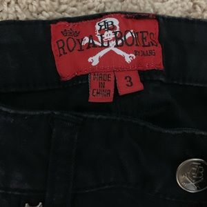 Black ripped jeans..